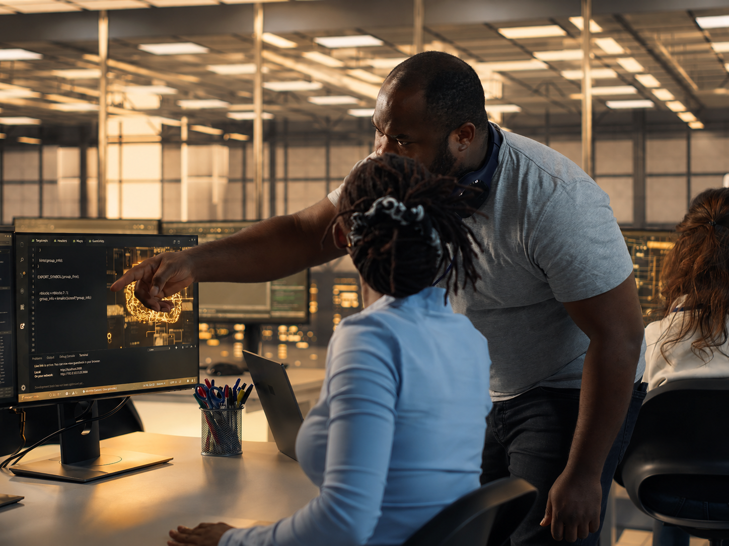 Supervisor guiding a colleague using artificial intelligence software